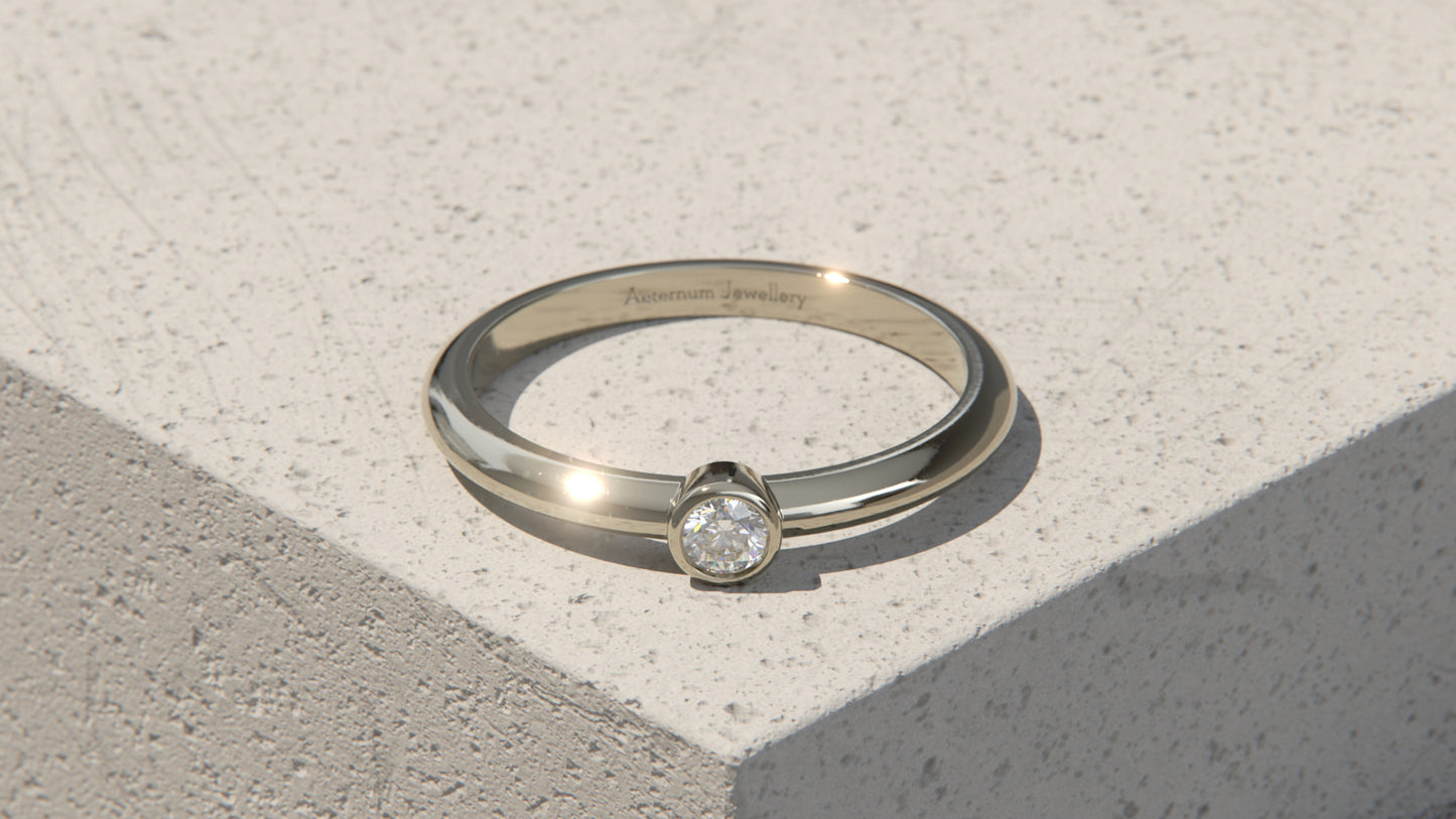 0.10ct Diamond Bezel Set Ring - 9ct White Gold
